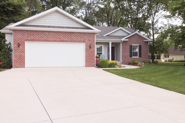 3 Cobblestone Ct, Delphi, IN 49623 - ranch-style home featuring brick siding, a front yard, and a garage