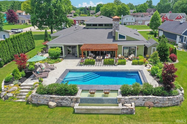 51257 Blue Ribbon Ln, Elkhart, IN 46514 - swimming pool with a patio area, a residential view, and a lawn