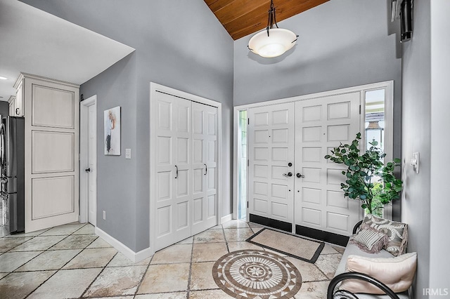 51257 Blue Ribbon Ln, Elkhart, IN 46514 - foyer featuring high vaulted ceiling and wood ceiling