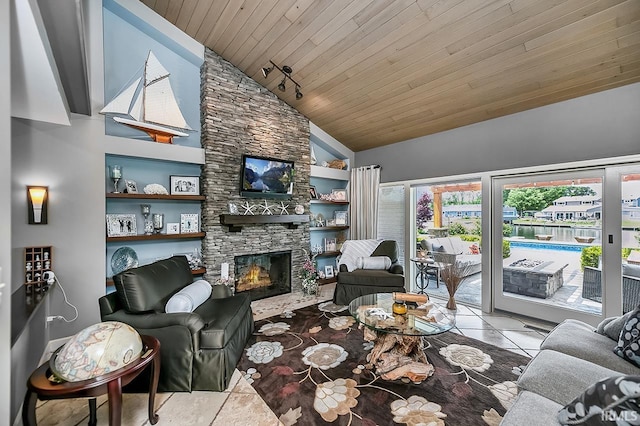 51257 Blue Ribbon Ln, Elkhart, IN 46514 - living area featuring tile patterned floors, a fireplace, wooden ceiling, and high vaulted ceiling