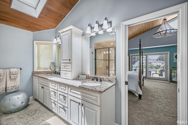 51257 Blue Ribbon Ln, Elkhart, IN 46514 - full bath with wooden ceiling, lofted ceiling, a shower stall, double vanity, and a skylight