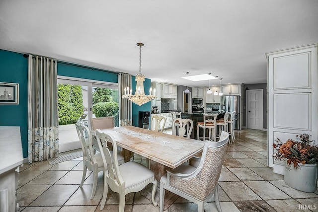 51257 Blue Ribbon Ln, Elkhart, IN 46514 - dining room featuring a chandelier and baseboards