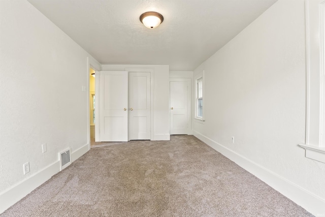 407 W Branning Ave, Fort Wayne, IN 46807 - unfurnished bedroom featuring carpet flooring