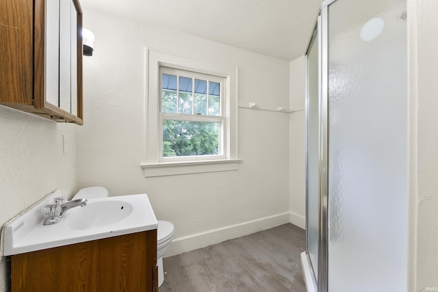 407 W Branning Ave, Fort Wayne, IN 46807 - bathroom with a shower stall, vanity, and wood finished floors
