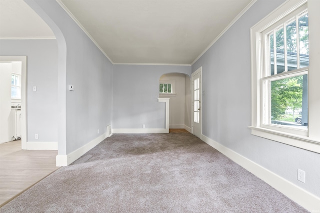 407 W Branning Ave, Fort Wayne, IN 46807 - carpeted empty room with arched walkways and crown molding
