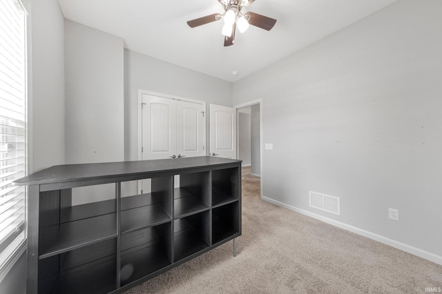 13233 Mera Cv, Fort Wayne, IN 46814 - unfurnished bedroom featuring light carpet and a ceiling fan