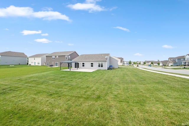 13233 Mera Cv, Fort Wayne, IN 46814 - rear view of house featuring a gazebo, a residential view, a yard, and a patio area