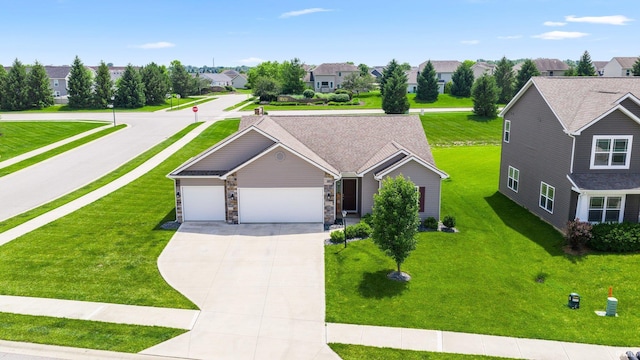 13233 Mera Cv, Fort Wayne, IN 46814 - view of front of house featuring driveway, a residential view, a garage, and a front yard