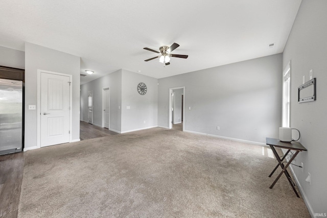13233 Mera Cv, Fort Wayne, IN 46814 - unfurnished living room with a ceiling fan and carpet