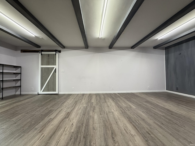 806 N Tippy Dr, Marion, IN 46952 - basement with a barn door and wood finished floors