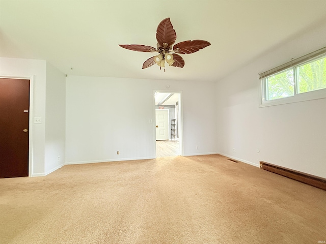 806 N Tippy Dr, Marion, IN 46952 - unfurnished room featuring light carpet and ceiling fan