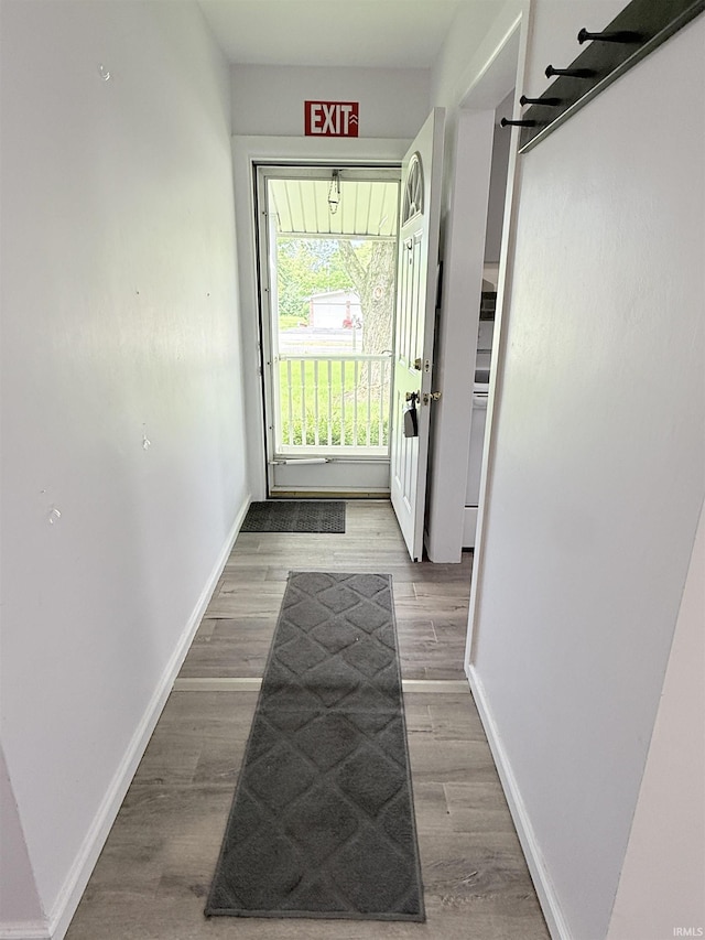 806 N Tippy Dr, Marion, IN 46952 - entryway with baseboards and wood finished floors