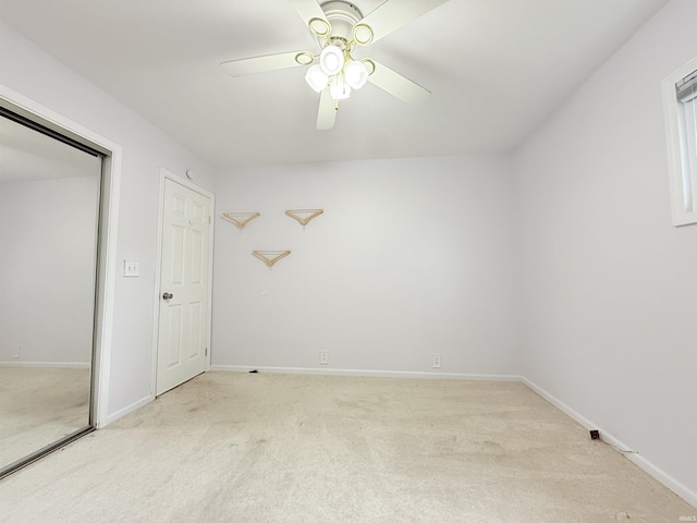 806 N Tippy Dr, Marion, IN 46952 - unfurnished bedroom with light carpet, ceiling fan, and a closet