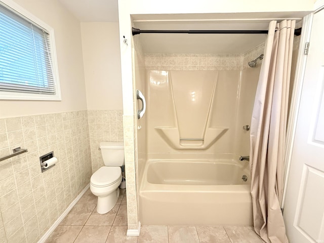 806 N Tippy Dr, Marion, IN 46952 - full bath featuring tile walls, shower / bath combination with curtain, tile patterned flooring, and wainscoting