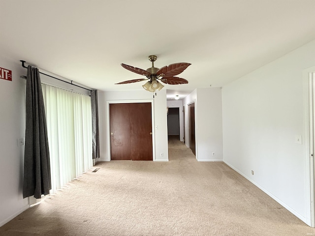 806 N Tippy Dr, Marion, IN 46952 - spare room with light colored carpet and a ceiling fan