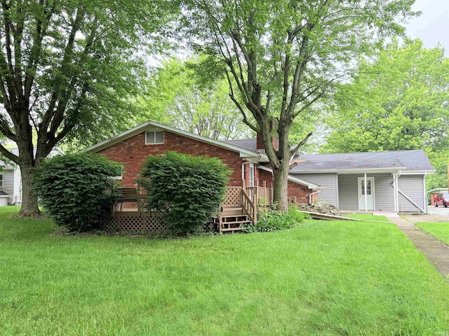 806 N Tippy Dr, Marion, IN 46952 - ranch-style house with a front lawn and brick siding