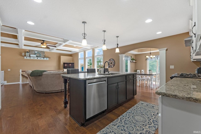 1176 W Whitetail Dr, Columbia City, IN 46725 - kitchen with stainless steel dishwasher, arched walkways, a chandelier, dark wood-style flooring, and coffered ceiling