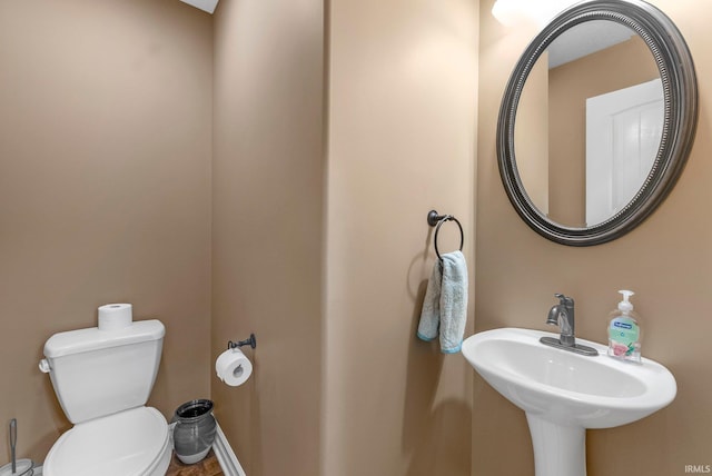 1176 W Whitetail Dr, Columbia City, IN 46725 - half bathroom with toilet and a sink