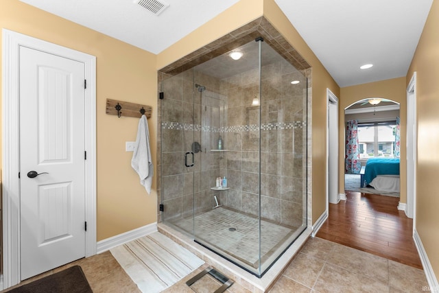 1176 W Whitetail Dr, Columbia City, IN 46725 - ensuite bathroom with a shower stall and tile patterned flooring