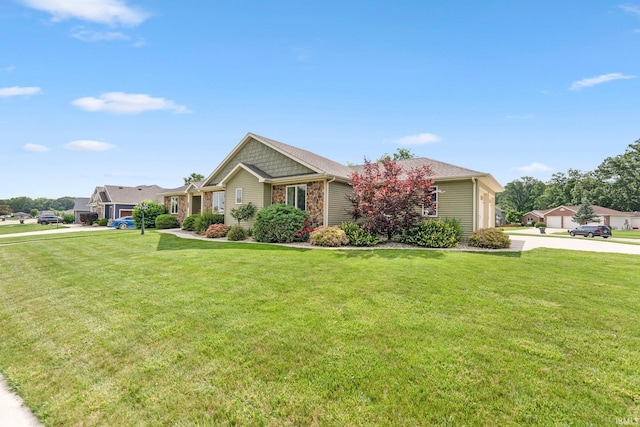 1176 W Whitetail Dr, Columbia City, IN 46725 - view of front facade with a garage, a front lawn, and driveway