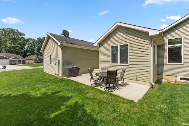 1176 W Whitetail Dr, Columbia City, IN 46725 - rear view of house with a lawn and a patio