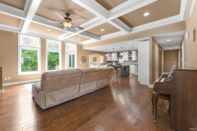 1176 W Whitetail Dr, Columbia City, IN 46725 - living room featuring coffered ceiling, a ceiling fan, beam ceiling, dark wood-type flooring, and crown molding