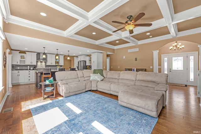 1176 W Whitetail Dr, Columbia City, IN 46725 - living room featuring hardwood / wood-style floors, coffered ceiling, a ceiling fan, beam ceiling, and ornamental molding