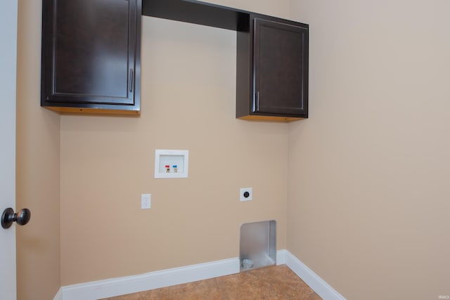 15442 Aj Dr, Evansville, IN 47725 - laundry area featuring electric dryer hookup, hookup for a washing machine, cabinet space, and tile patterned flooring