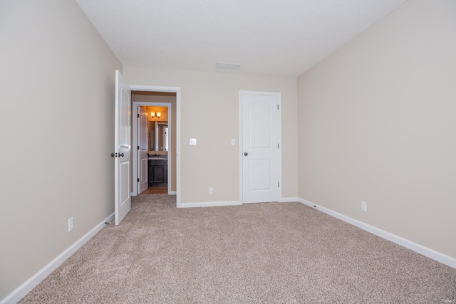 15442 Aj Dr, Evansville, IN 47725 - unfurnished bedroom with light carpet and baseboards