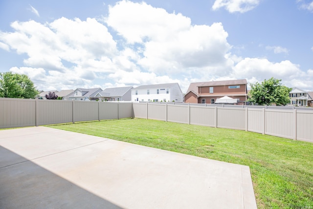15442 Aj Dr, Evansville, IN 47725 - fenced backyard with a patio area and a residential view