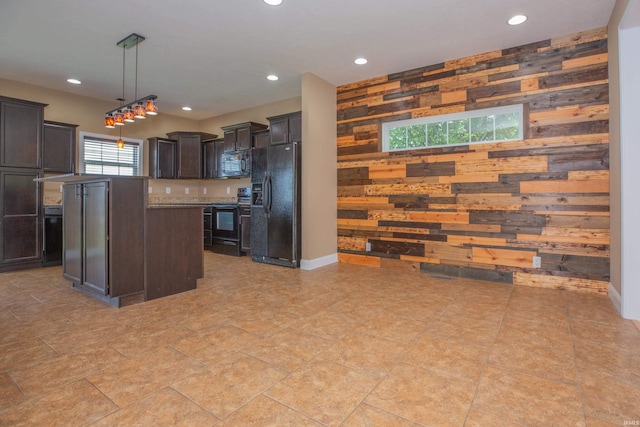 15442 Aj Dr, Evansville, IN 47725 - kitchen with black appliances, wood walls, recessed lighting, light countertops, and dark brown cabinetry