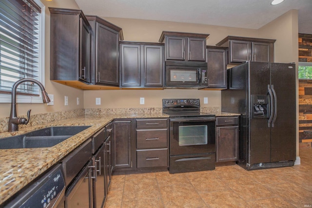 15442 Aj Dr, Evansville, IN 47725 - kitchen featuring black appliances, dark brown cabinets, light stone counters, and recessed lighting