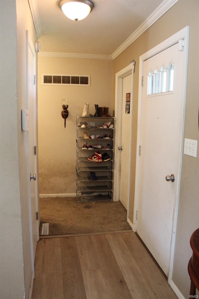 50859 Oak Tree Ln, Bristol, IN 46507 - hall featuring wood finished floors and ornamental molding