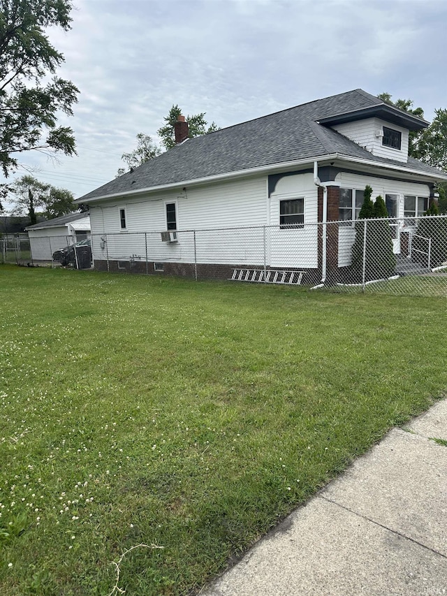 731 Johnson St, South Bend, IN 46628 - view of property exterior featuring roof with shingles and a chimney