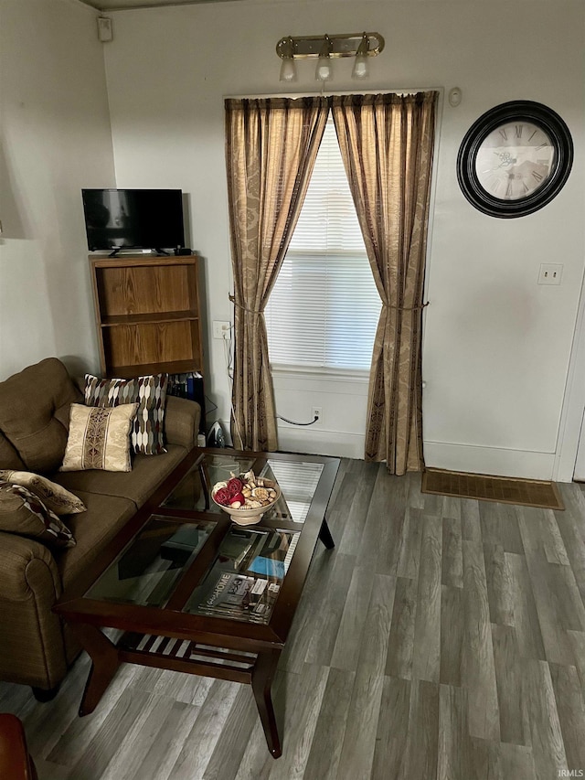 731 Johnson St, South Bend, IN 46628 - living area featuring wood finished floors and baseboards
