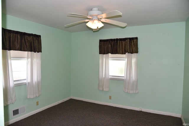 2726 S Roena St, Indianapolis, IN 46241 - empty room featuring ceiling fan and dark colored carpet
