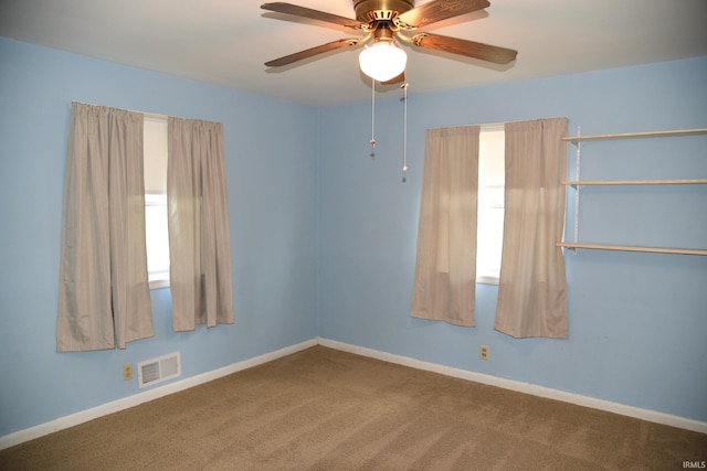 2726 S Roena St, Indianapolis, IN 46241 - carpeted empty room with ceiling fan and baseboards