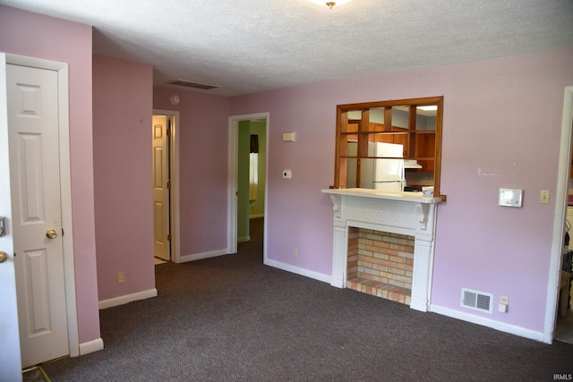 2726 S Roena St, Indianapolis, IN 46241 - unfurnished living room with a textured ceiling, a fireplace, and carpet floors