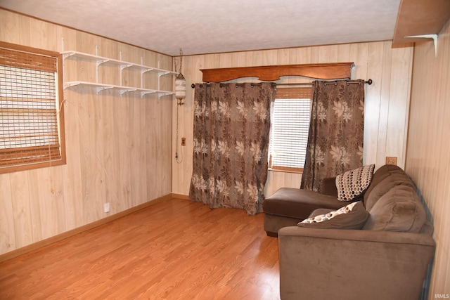 2726 S Roena St, Indianapolis, IN 46241 - living room featuring wooden walls and wood finished floors