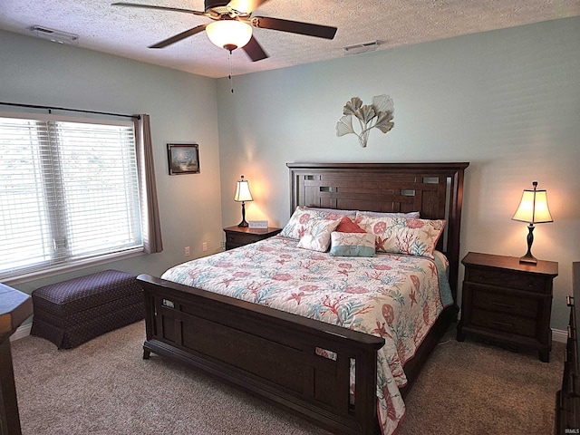 3520 Lintel Dr, West Lafayette, IN 47906 - carpeted bedroom with a textured ceiling and ceiling fan