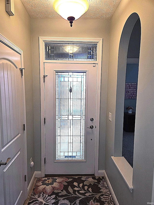 3520 Lintel Dr, West Lafayette, IN 47906 - entryway featuring baseboards and arched walkways