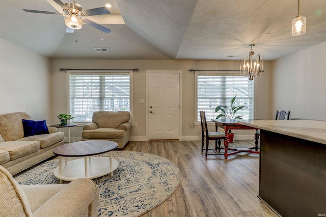 904-3 Reyling Dr, Jasper, IN 47546 - living area with plenty of natural light, light wood-type flooring, ceiling fan, a chandelier, and lofted ceiling