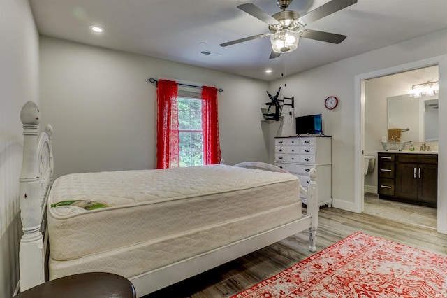 904-3 Reyling Dr, Jasper, IN 47546 - bedroom featuring light wood-style floors, recessed lighting, ceiling fan, and ensuite bath