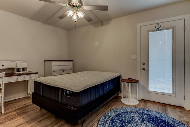 904-3 Reyling Dr, Jasper, IN 47546 - bedroom with wood finished floors and a ceiling fan