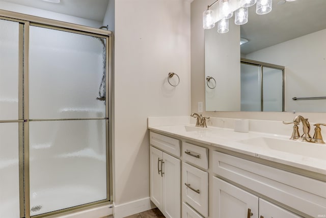 904-3 Reyling Dr, Jasper, IN 47546 - full bathroom with a stall shower and double vanity