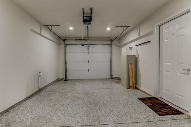 904-3 Reyling Dr, Jasper, IN 47546 - garage featuring a garage door opener and recessed lighting