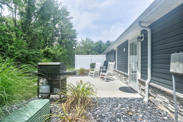 904-3 Reyling Dr, Jasper, IN 47546 - view of patio featuring a grill