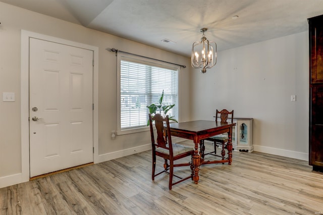 904-3 Reyling Dr, Jasper, IN 47546 - dining room featuring a chandelier and light wood-style floors