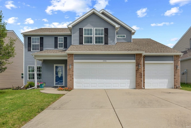 5590 Westfalen Way, Lafayette, IN 47905 - view of front of home featuring driveway, brick siding, a front yard, and a shingled roof