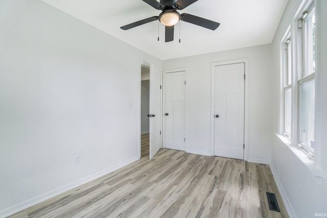 5729 Saint Joe Center Rd, Fort Wayne, IN 46835 - unfurnished bedroom with light wood-type flooring and a ceiling fan
